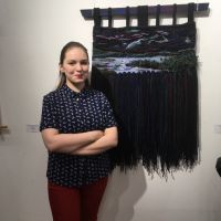 Виталия с гобеленом Гроза на регион выставке Север 2017